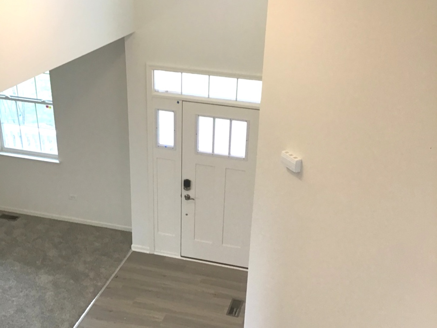 3118 Patterson Road Montgomery, IL 60538 - Photo 3 of 23 an empty room with windows
