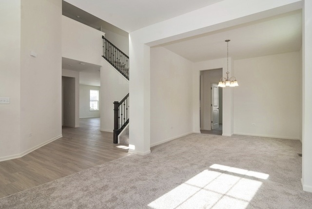 3118 Patterson Road Montgomery, IL 60538 - Photo 5 of 23 a view of a hallway view with staircase