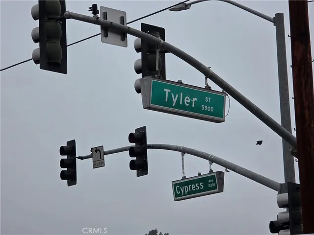 a view of a field with floor to ceiling window