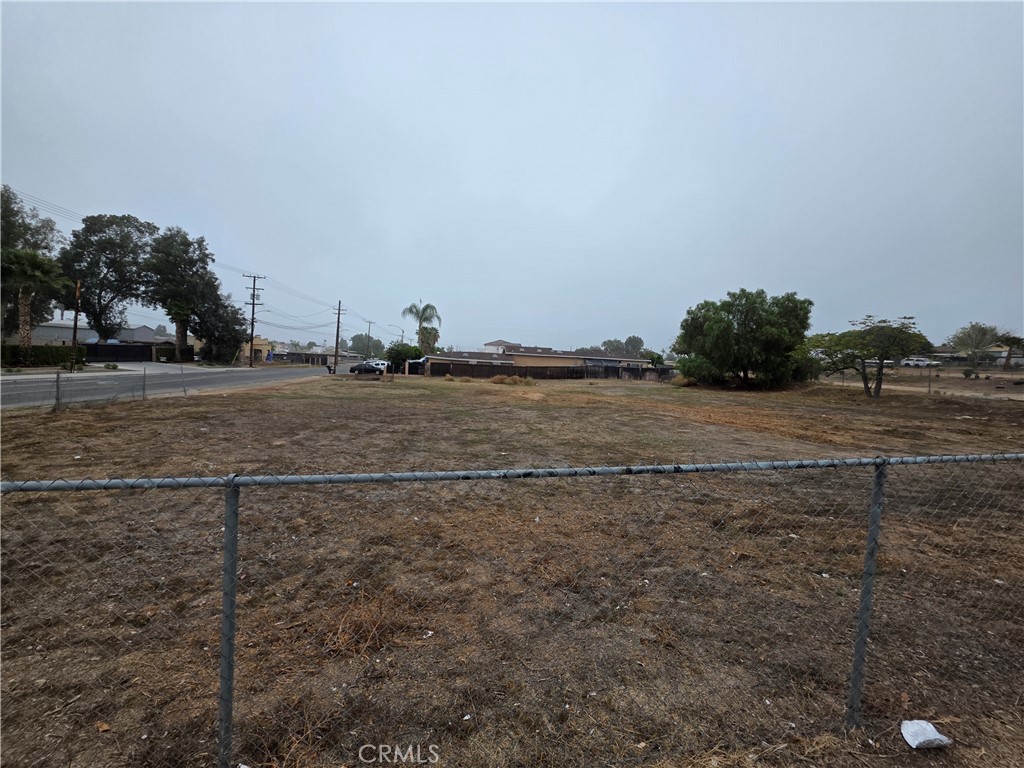 5995 Tyler Street Riverside, CA 92503 - Photo 6 of 10 a view of a field with floor to ceiling window