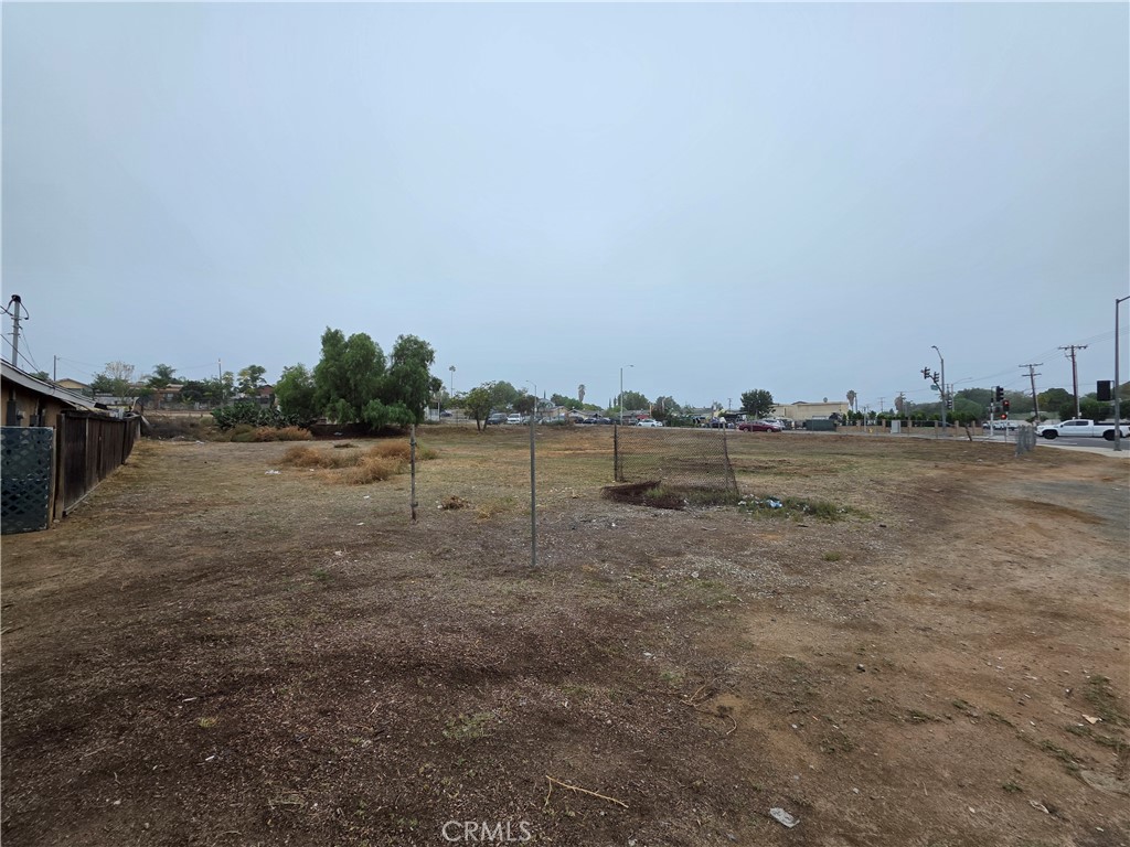 5995 Tyler Street Riverside, CA 92503 - Photo 9 of 10 a view of a field with trees in background