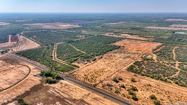 an aerial view of beach and ocean