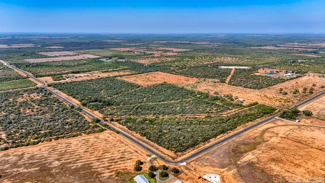 a view of a city with an ocean view