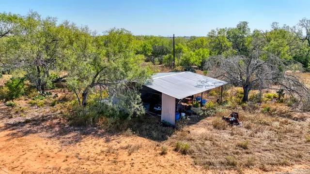 a pathway of a house with a yard