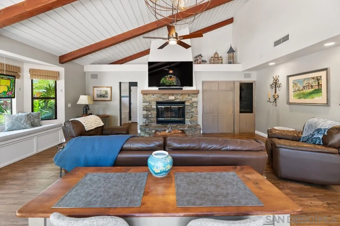 14725 Espola Road Poway, CA 92064 - Photo 14 of 50 a living room with furniture and a fireplace