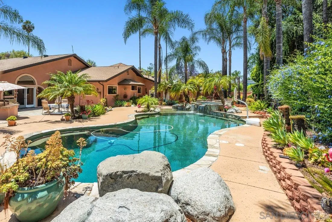 14725 Espola Road Poway, CA 92064 - Photo 30 of 50 a front view of a house with garden