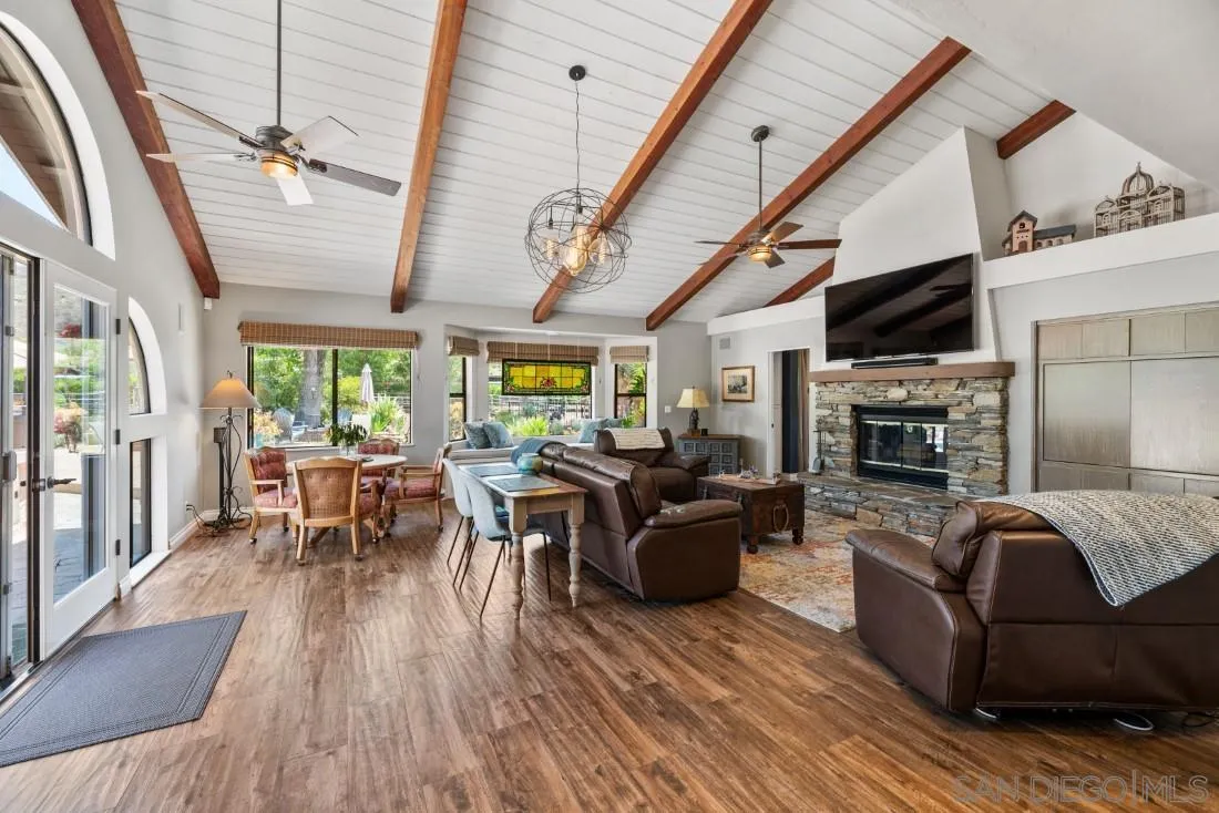 14725 Espola Road Poway, CA 92064 - Photo 3 of 50 a living room with furniture fireplace and flat screen tv