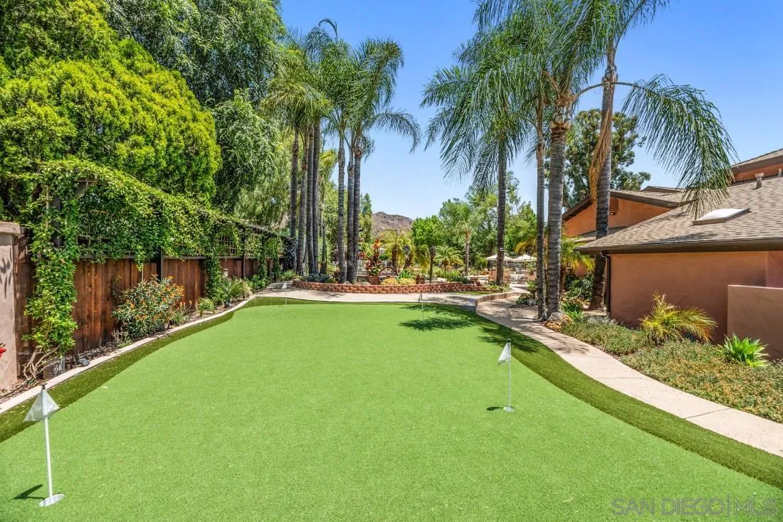 14725 Espola Road Poway, CA 92064 - Photo 34 of 50 a view of swimming pool with a table and chairs
