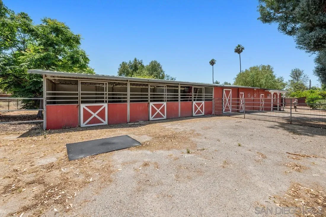 14725 Espola Road Poway, CA 92064 - Photo 42 of 50 a view of a backyard with wooden fence