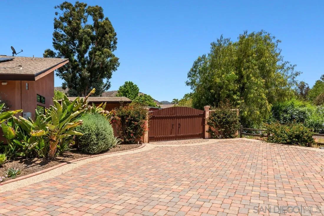14725 Espola Road Poway, CA 92064 - Photo 48 of 50 a view of a house with a yard and sitting area