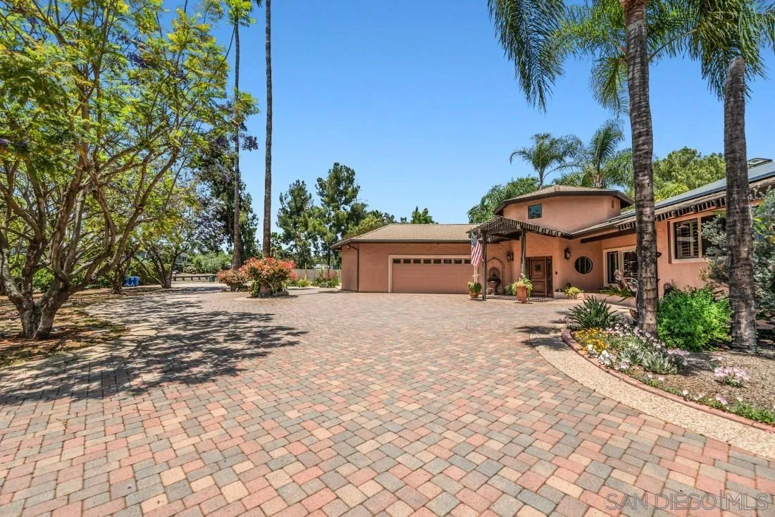 14725 Espola Road Poway, CA 92064 - Photo 49 of 50 a front view of a house with a yard