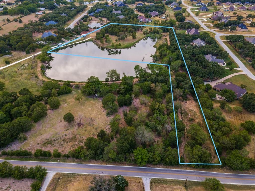 Tbd Retta Mansfield Road Mansfield, TX 76063 - Photo 2 of 2 an aerial view of house with yard swimming pool and outdoor seating