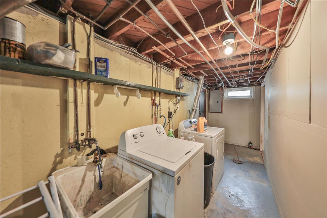 3050 Cornwall Road Bethlehem, PA 18017 - Photo 56 of 80 Functional basement laundry area featuring washer, dryer, and utility sink for everyday needs.