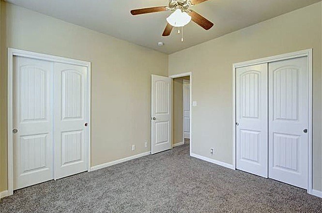 14001 Avery Ranch Boulevard, Unit 801 Austin, TX 78717 - Photo 24 of 26 Ample closet space and soft carpeting await in this cozy room.