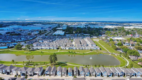 a view of a swimming pool with an ocean view