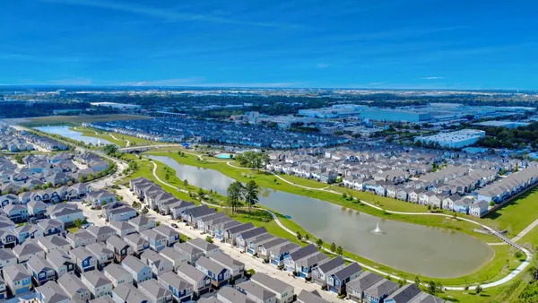 a view of a swimming pool with an ocean view