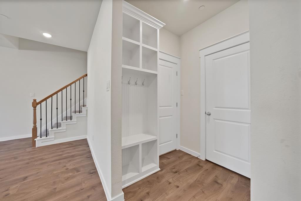 6610 Baritone Court Sachse, TX 75048 - Photo 12 of 30 a view of entryway with wooden floor