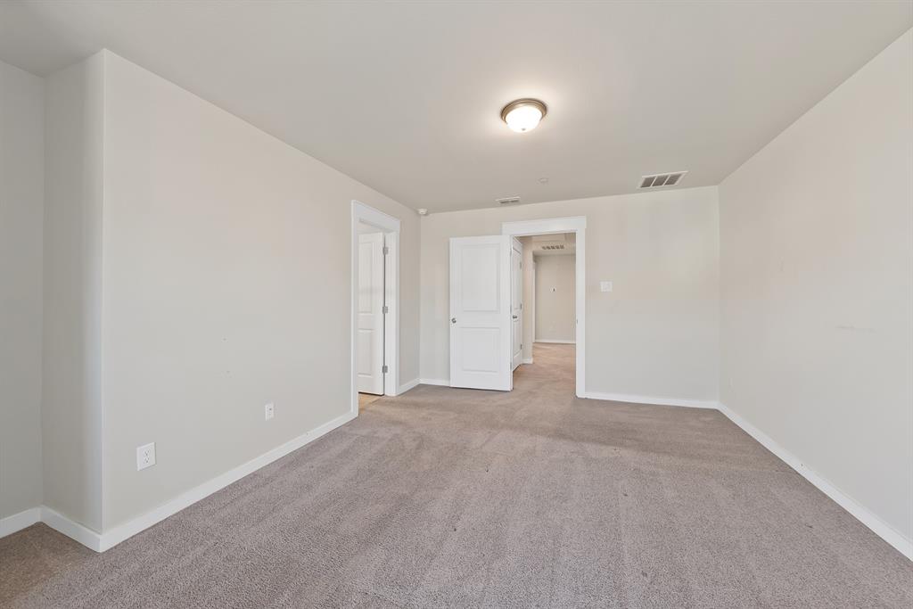 6610 Baritone Court Sachse, TX 75048 - Photo 18 of 30 a view of an empty room