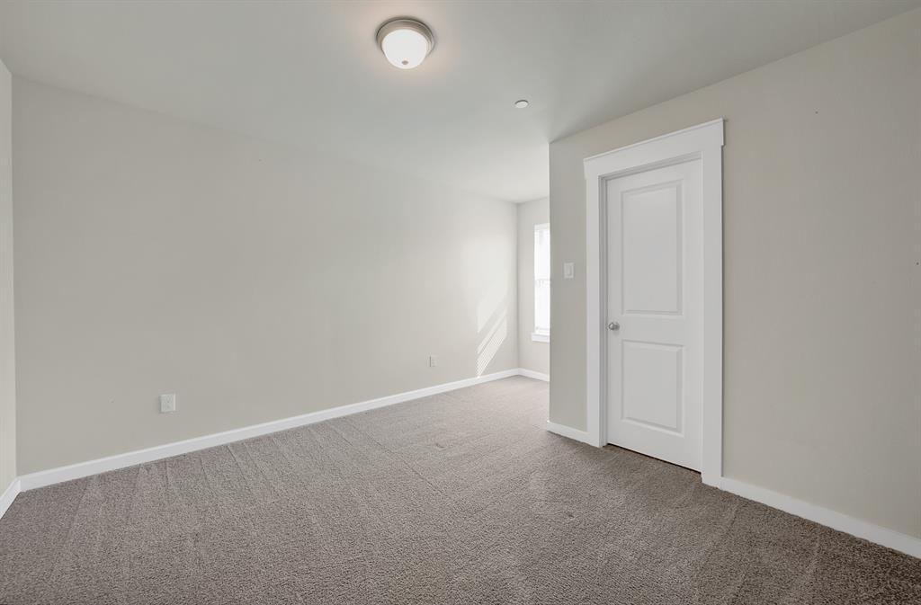 6610 Baritone Court Sachse, TX 75048 - Photo 22 of 30 an empty room with closet area