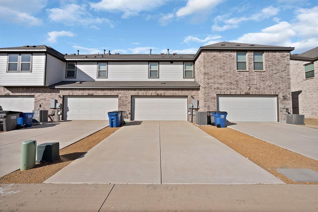 6610 Baritone Court Sachse, TX 75048 - Photo 28 of 30 a front view of a house with a yard