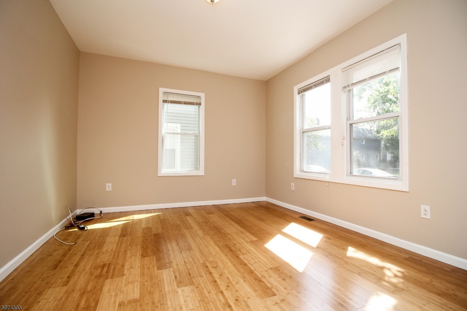 52 New Street, Unit A Montclair, NJ 07042 - Photo 12 of 18 a view of a room with wooden floor and a window