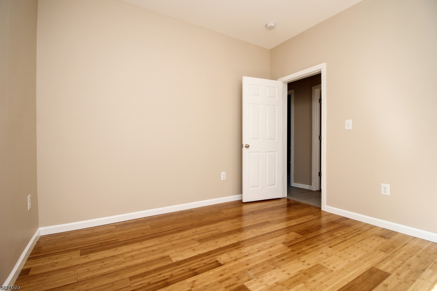 52 New Street, Unit A Montclair, NJ 07042 - Photo 10 of 18 a view of an empty room with wooden floor