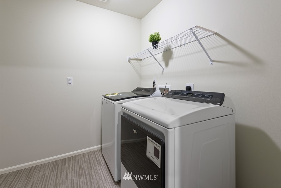 4815 Amherst Way Southwest Port Orchard, WA 98367 - Photo 12 of 12 a utility room with dryer and washer