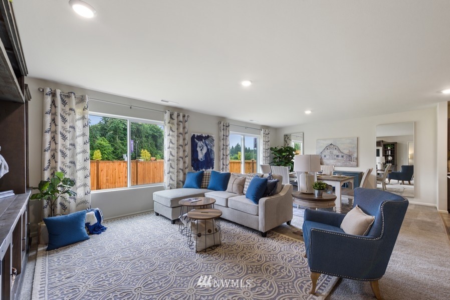 4815 Amherst Way Southwest Port Orchard, WA 98367 - Photo 3 of 12 a living room with furniture and a large window