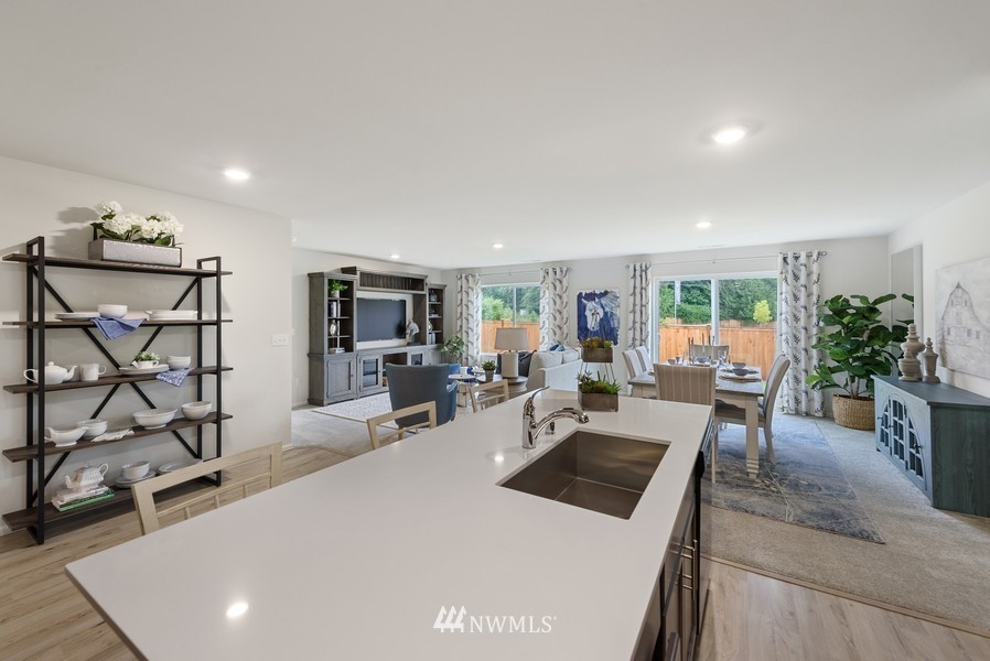 4815 Amherst Way Southwest Port Orchard, WA 98367 - Photo 5 of 12 a view of a living room and dining room