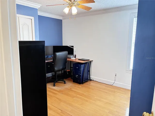 a room with furniture and wooden floor