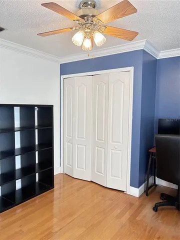 a view of room with a cabinet and workspace