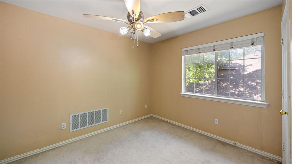 1508 Valley Creek Road Denton, TX 76205 - Photo 31 of 33 an empty room with a window