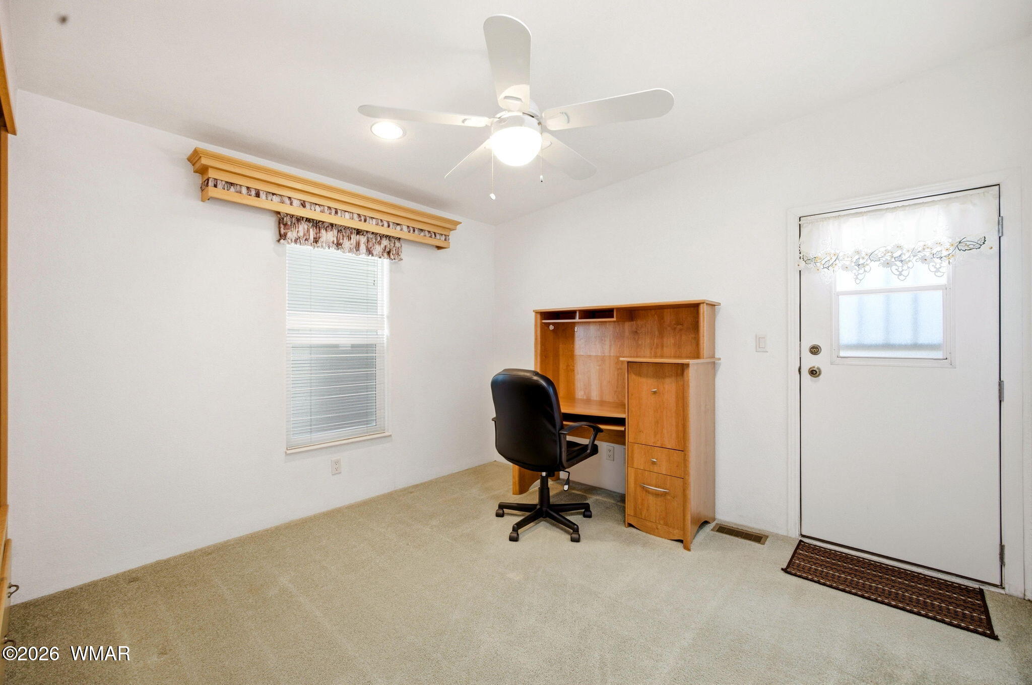 2275 Old Crooks Trail Overgaard, AZ 85933 - Photo 17 of 24 a view of a workspace with furniture and a window