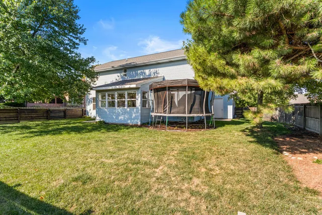 a house with trees in front of it