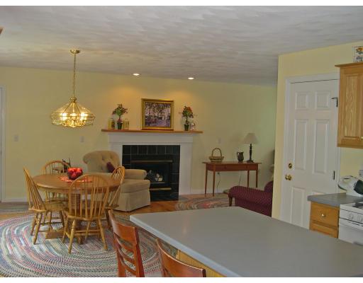 6 Wells Fargo Road Chelmsford, MA 01824 - Photo 5 of 28 a view of a dining room with furniture and chandelier