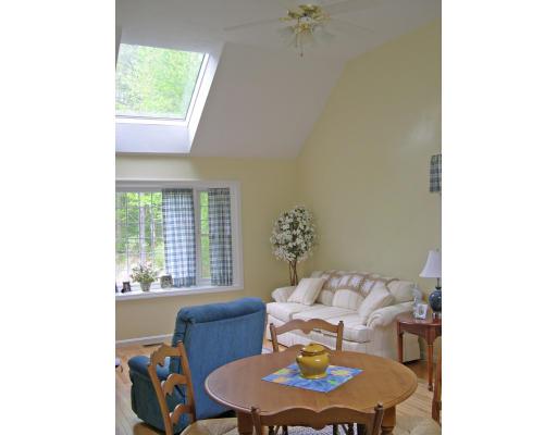 6 Wells Fargo Road Chelmsford, MA 01824 - Photo 7 of 28 a living room with furniture and a table