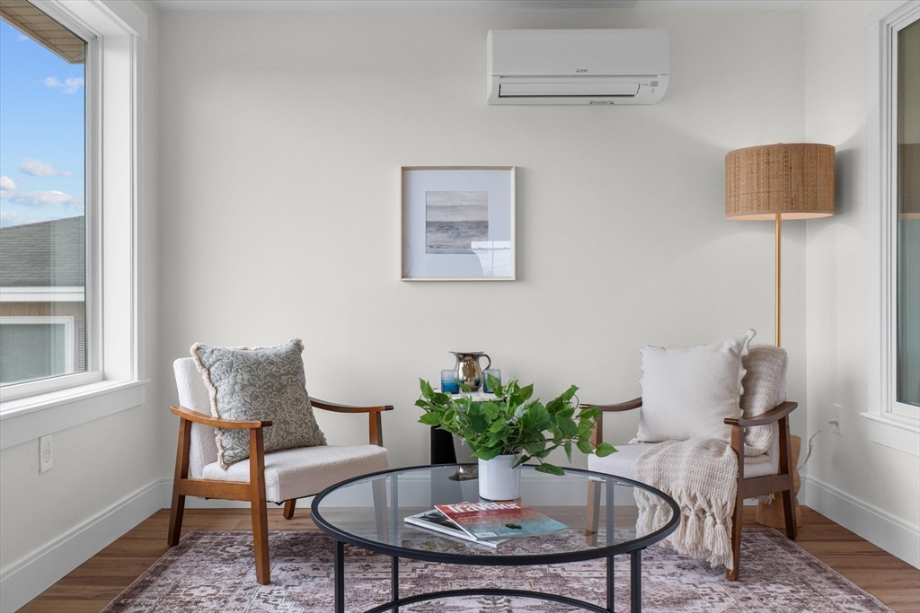 30 Cable Avenue, Unit 3 Salisbury, MA 01952 - Photo 18 of 31 a dining room with furniture and wooden floor
