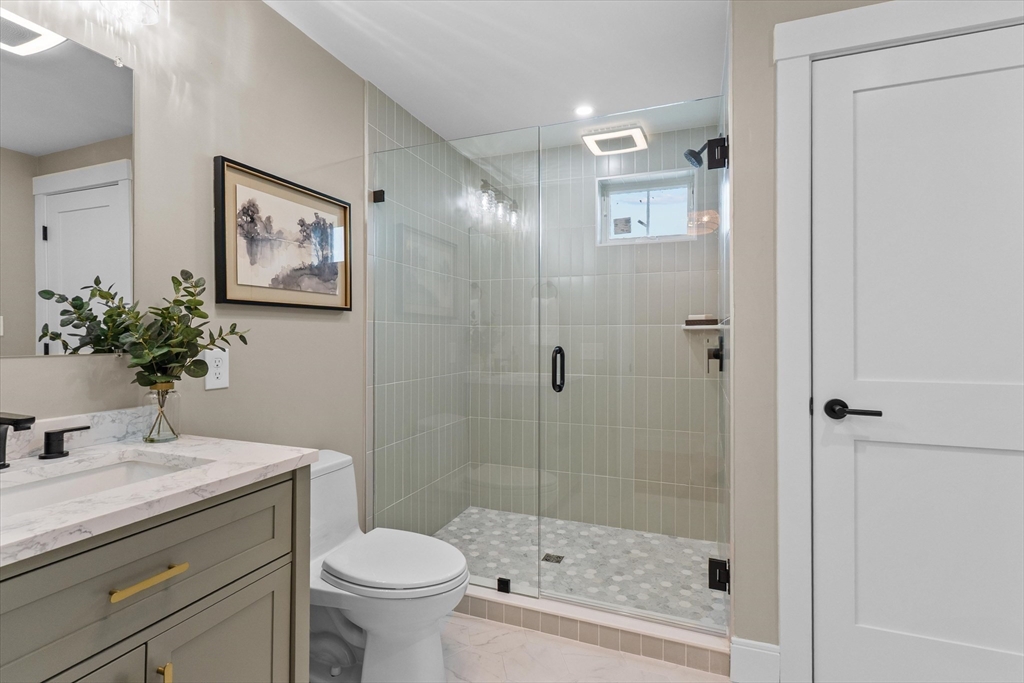 30 Cable Avenue, Unit 3 Salisbury, MA 01952 - Photo 23 of 31 a bathroom with a sink toilet and shower