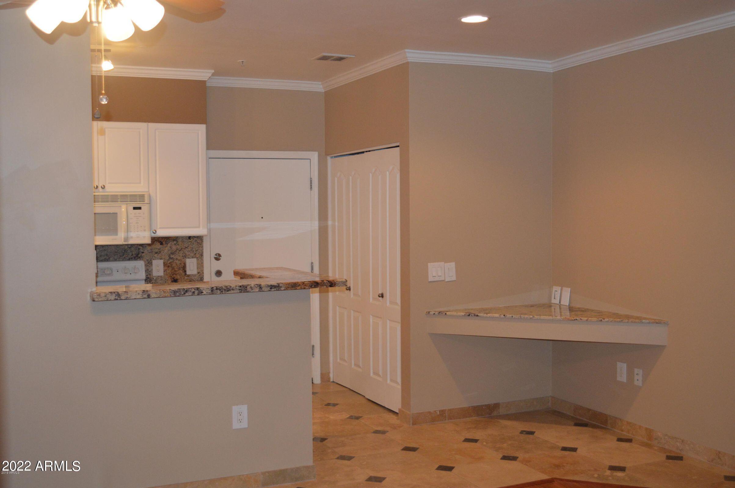 1701 East Colter Street, Unit 112 Phoenix, AZ 85016 - Photo 4 of 47 a bathroom with a sink and a mirror