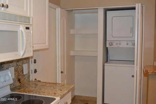 a view of a kitchen cabinets