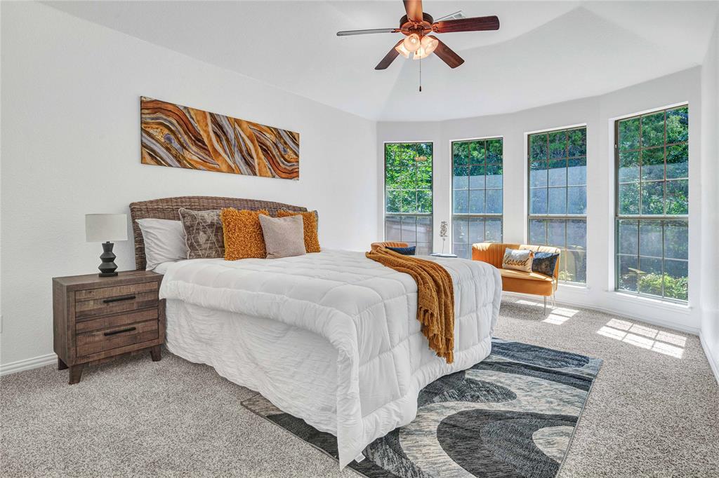 1504 Tangle Ridge Drive McKinney, TX 75071 - Photo 17 of 36 a bed room with a bed and a window