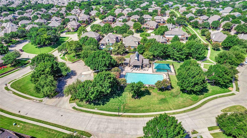 1504 Tangle Ridge Drive McKinney, TX 75071 - Photo 21 of 36 a view of a garden with a house