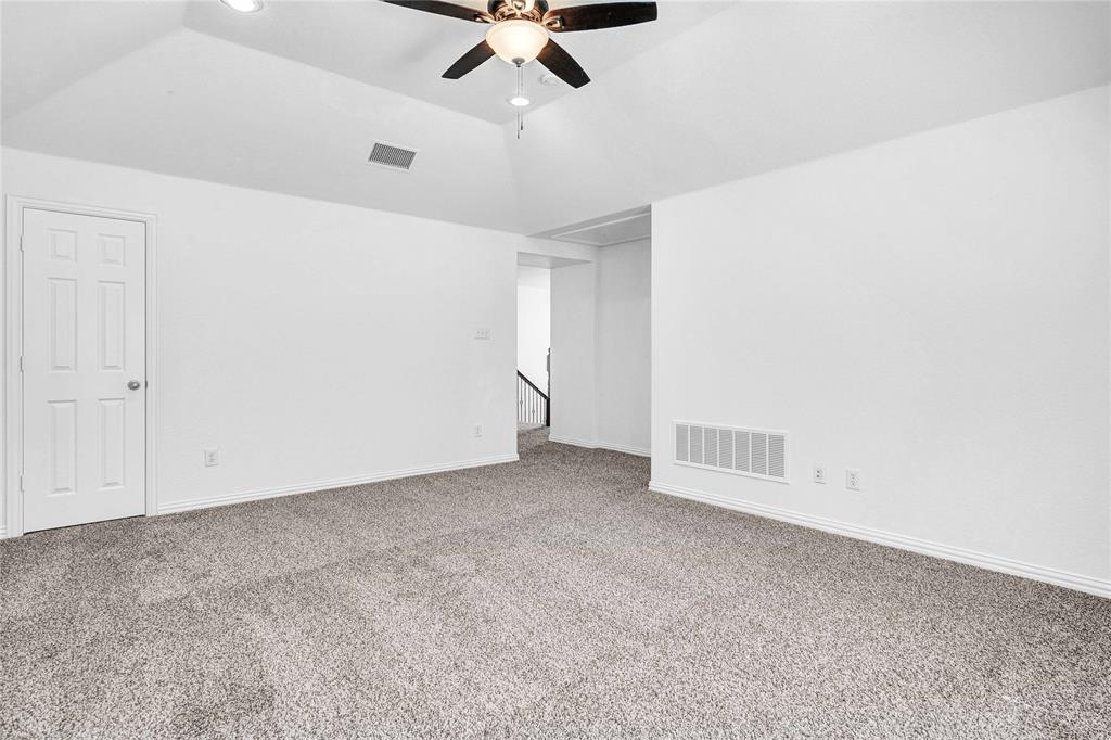 1504 Tangle Ridge Drive McKinney, TX 75071 - Photo 26 of 36 a view of an empty room