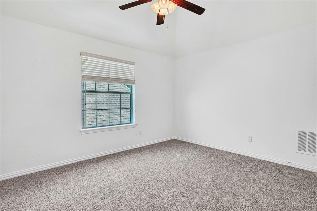 1504 Tangle Ridge Drive McKinney, TX 75071 - Photo 29 of 36 an empty room with a window