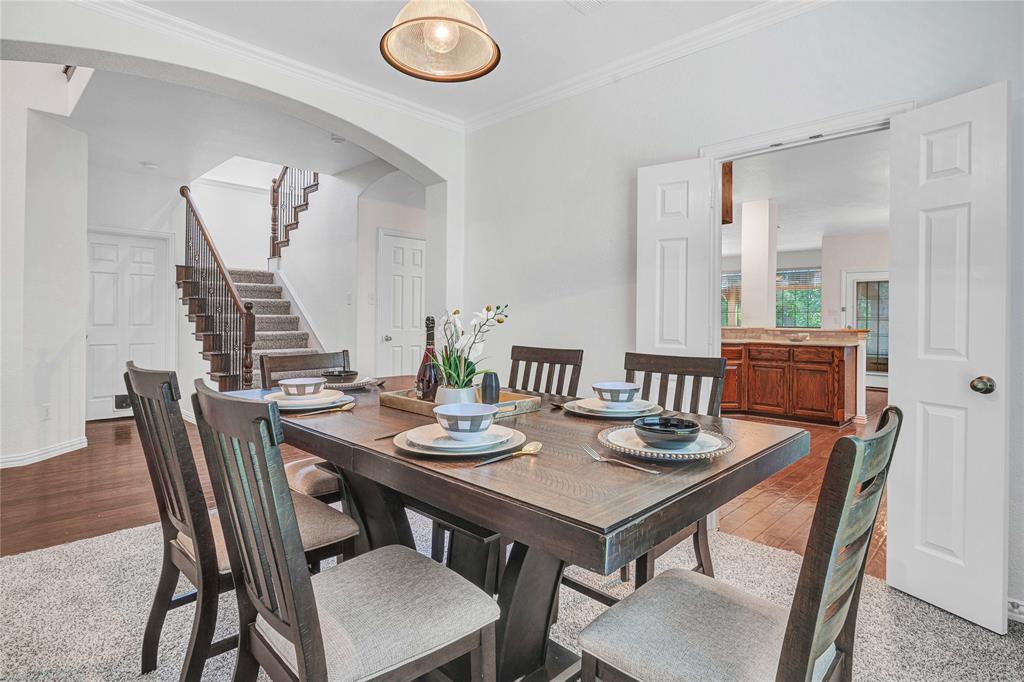 1504 Tangle Ridge Drive McKinney, TX 75071 - Photo 6 of 36 a view of a dining room with furniture