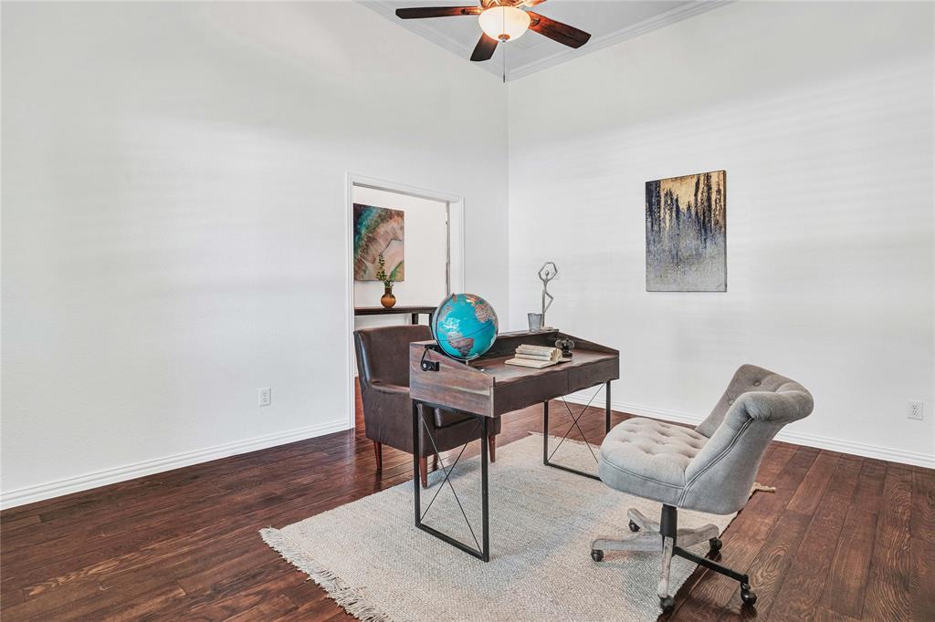 1504 Tangle Ridge Drive McKinney, TX 75071 - Photo 7 of 36 a view of a workspace with furniture