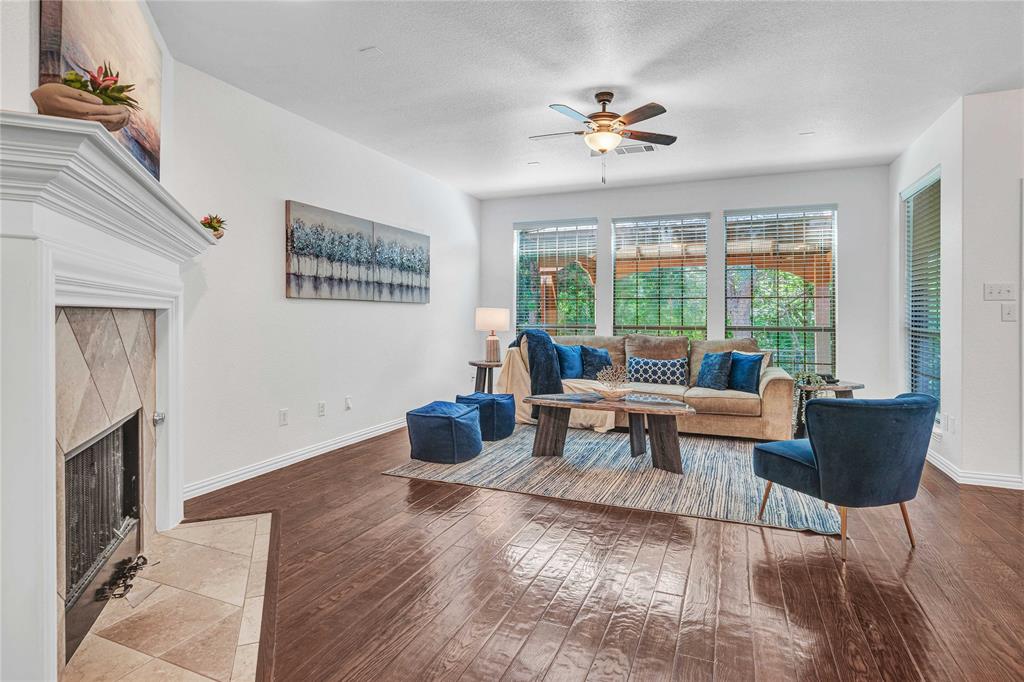 1504 Tangle Ridge Drive McKinney, TX 75071 - Photo 9 of 36 a living room with furniture and a window