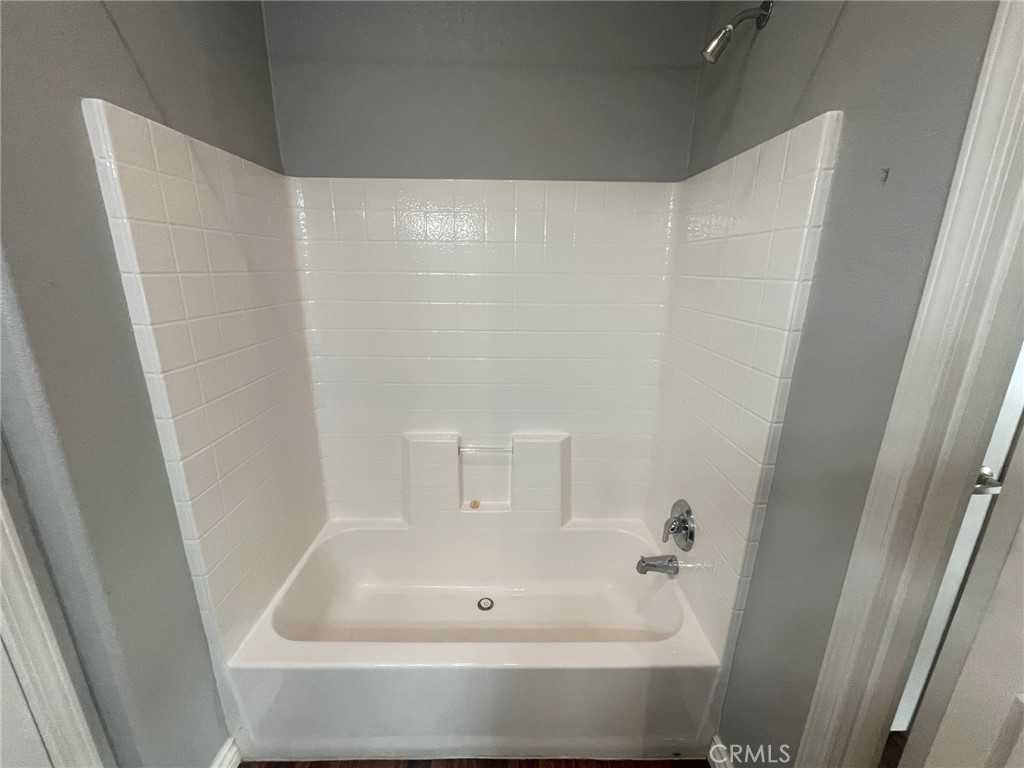 15181 Van Buren Boulevard, Unit 22 Riverside, CA 92504 - Photo 25 of 61 a bathroom with bathtub