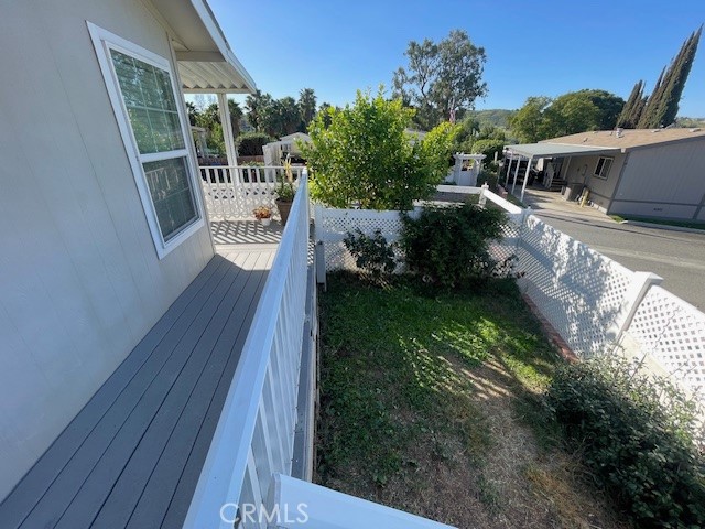 15181 Van Buren Boulevard, Unit 22 Riverside, CA 92504 - Photo 52 of 61 a view of balcony with yard