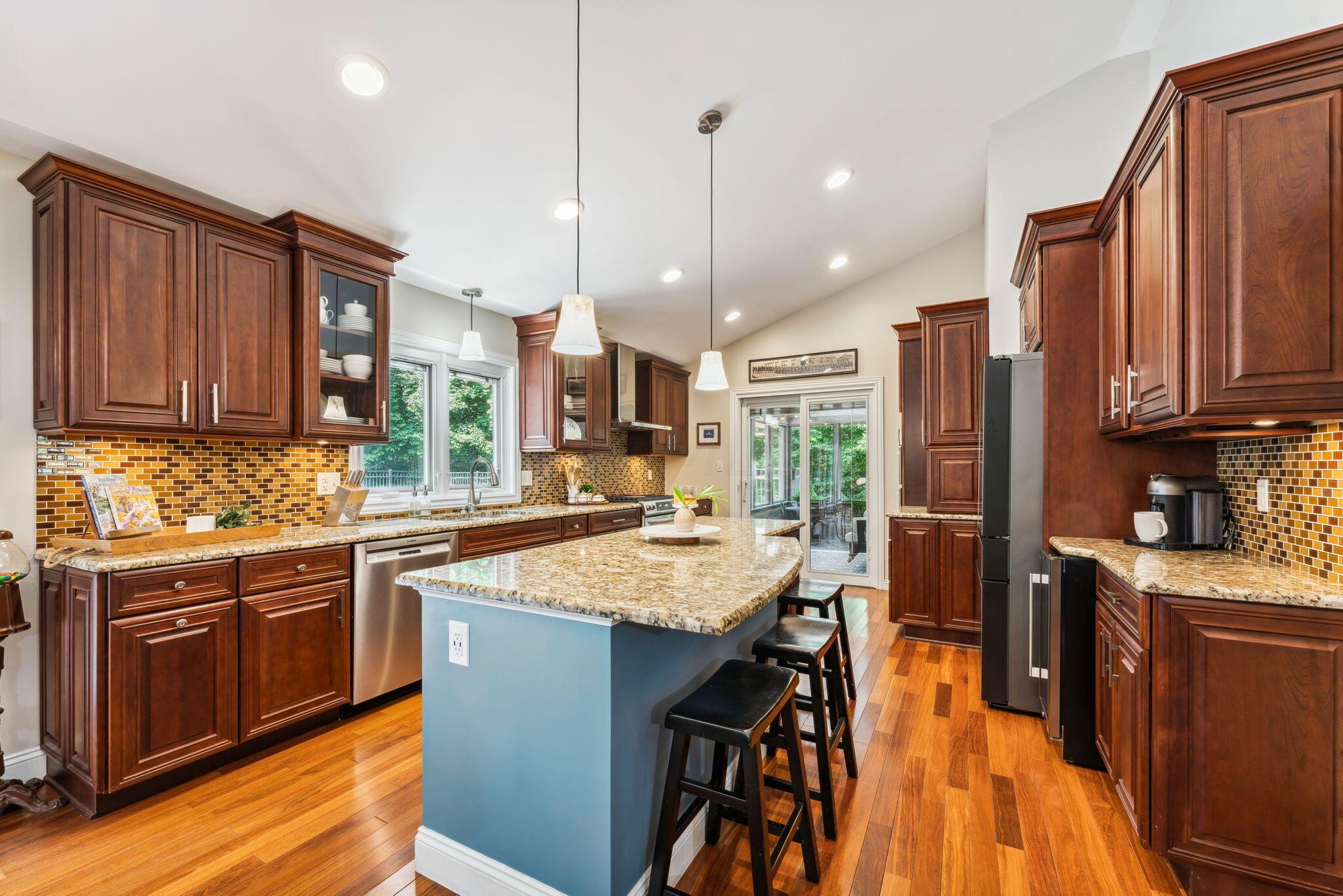 2423 Carriage Road Powell, OH 43065 - Photo 19 of 100 Upgraded cabinets, recessed lighting, granite countertops and SS appliances!